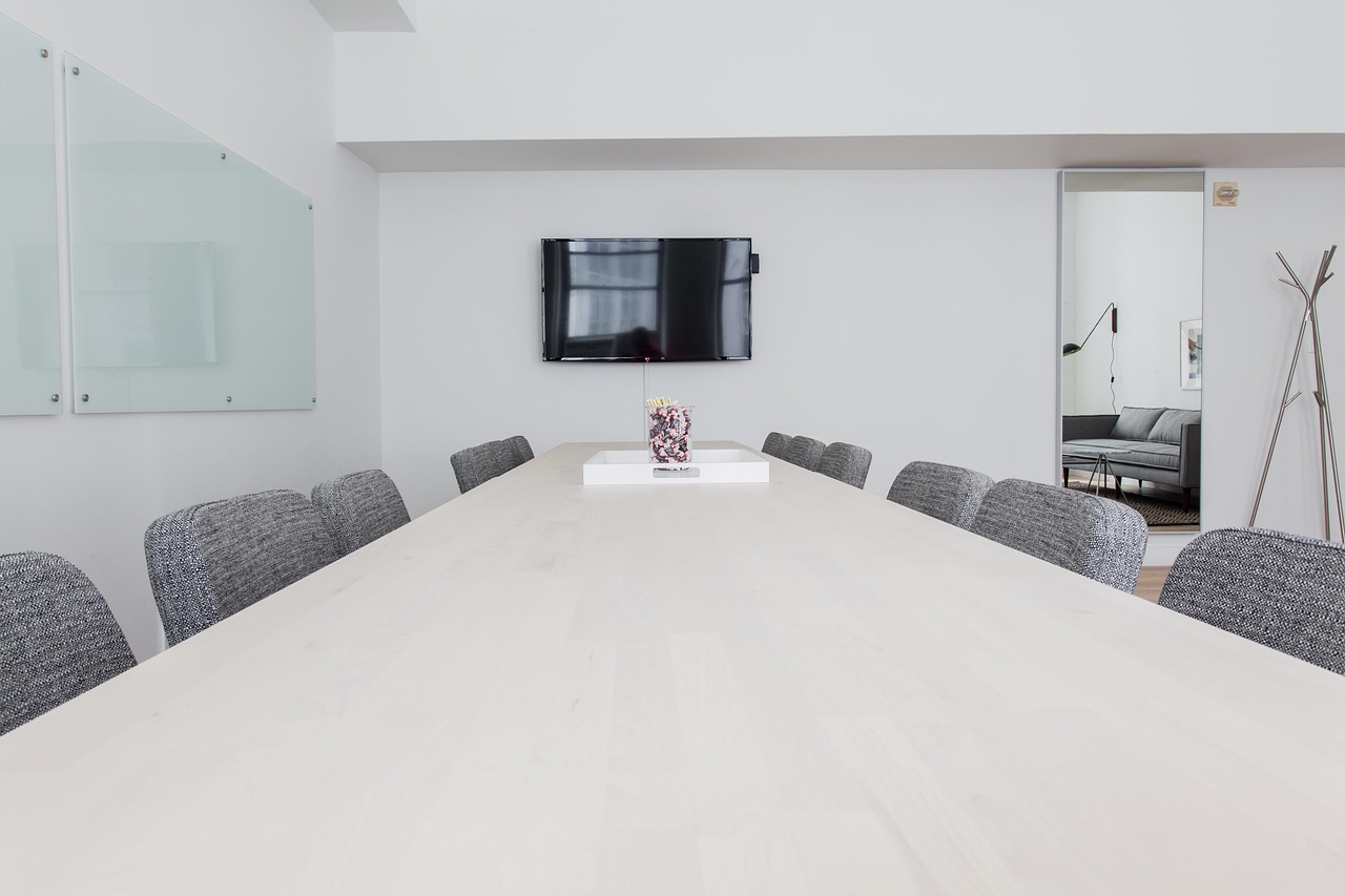 A leadership meeting room representing strategic decision-making informed by operational visibility