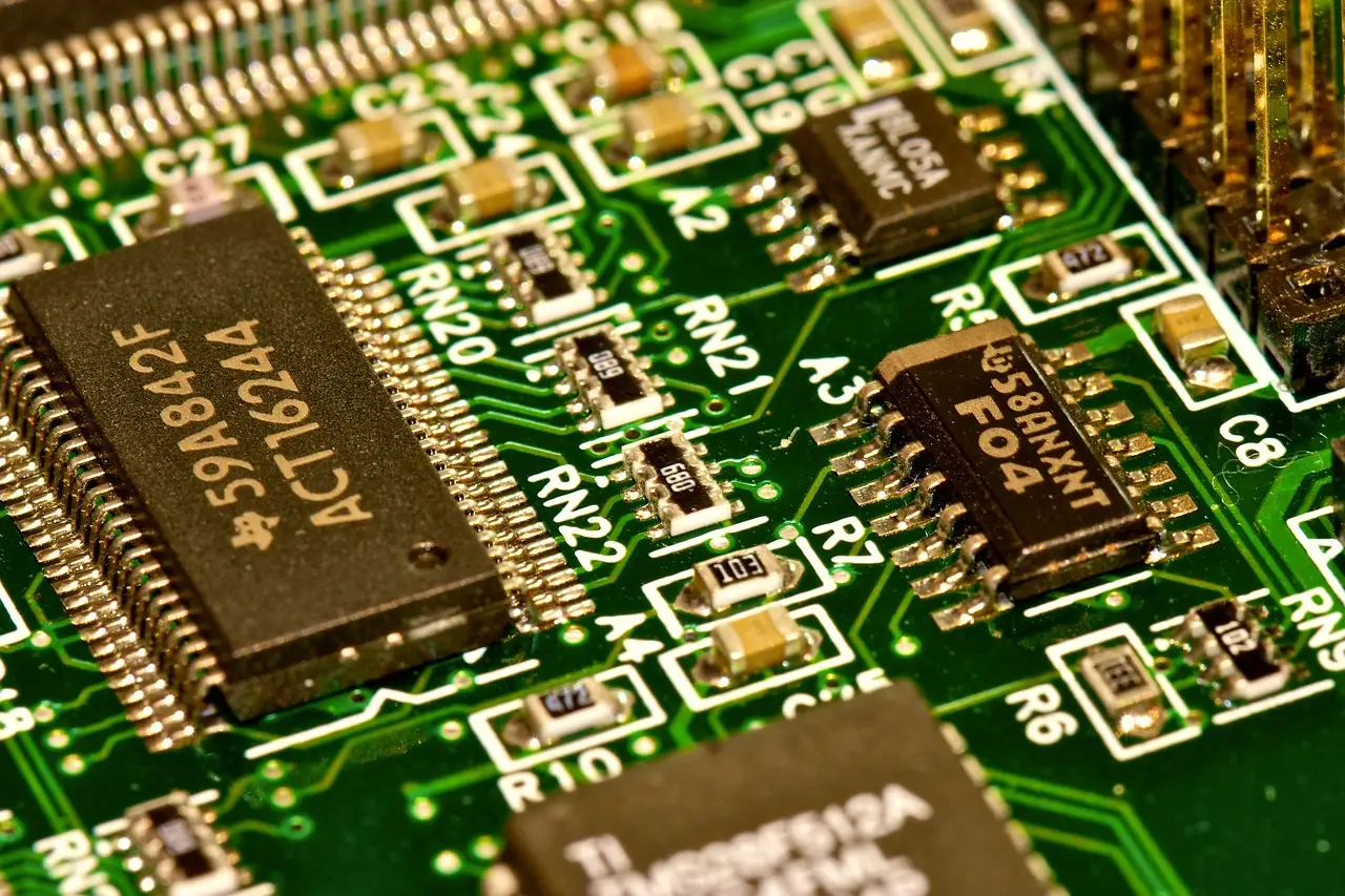 A close-up of a circuit board representing structured, repeatable systems